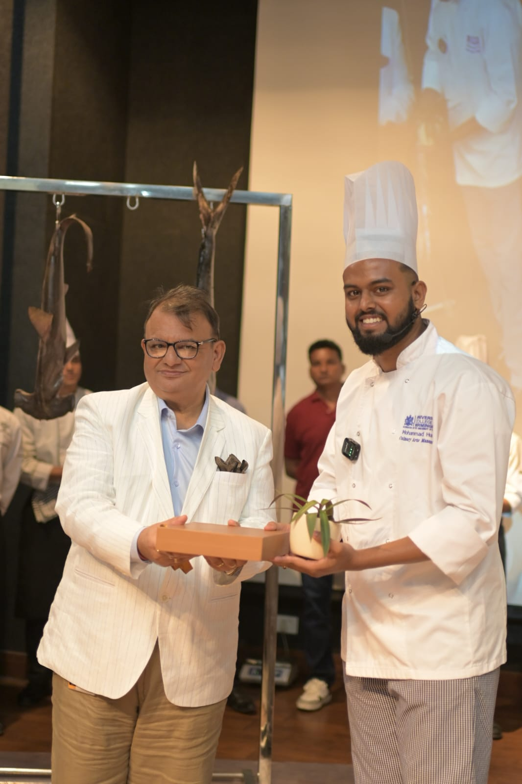 Chef Mohammad Husain being presented a memento by a senior hospitality professional at IHM Bhopal