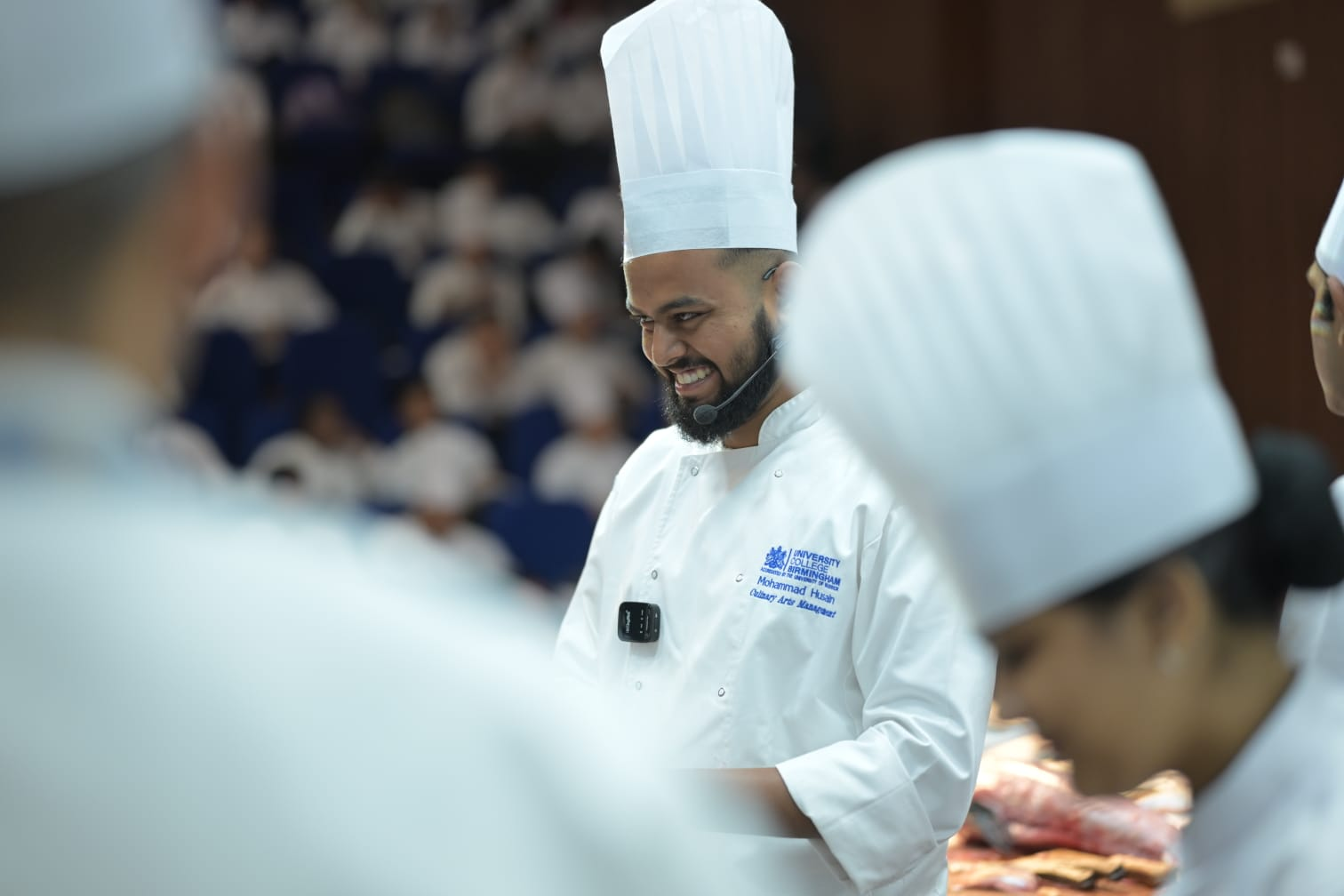 Close-up of Chef Mohammad Husain speaking to students during the seafood workshop at IHM Bhopal